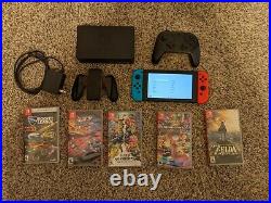 Nintendo Switch with 5 x games, power adapter, and extra controller